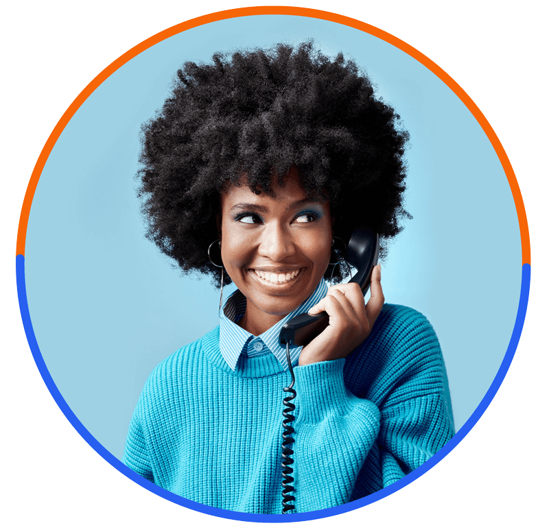 African American woman talking on home phone